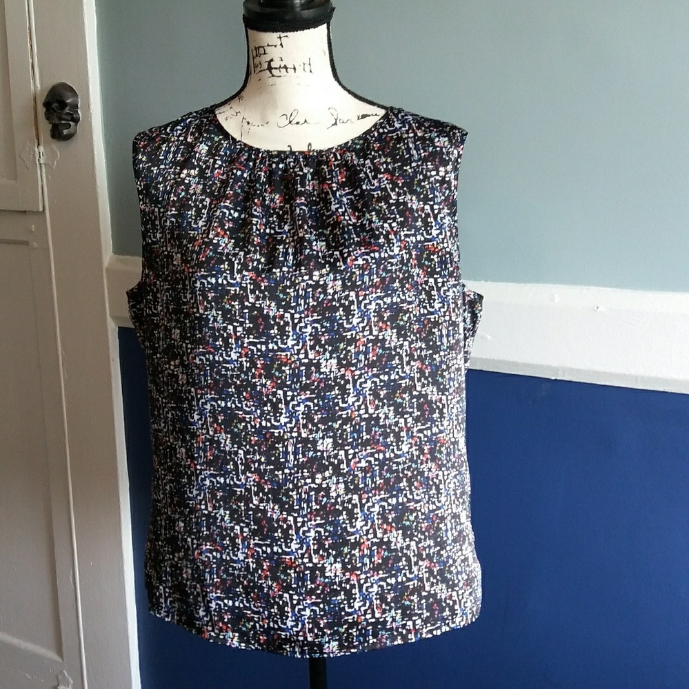 Tahari sleeveless  blouse.